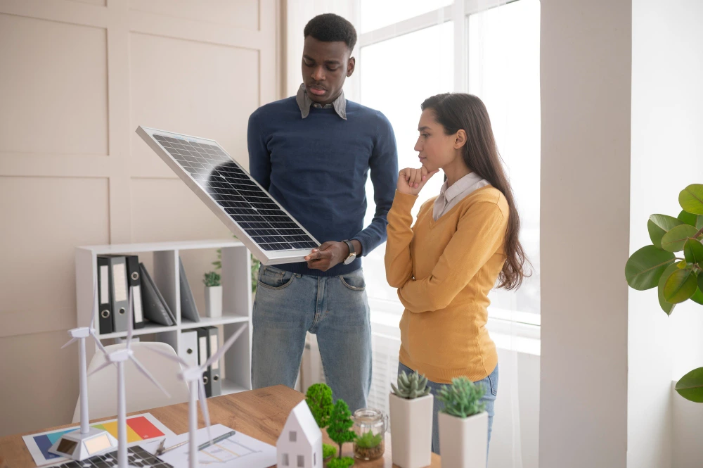 homeowner thinking about olar pannels and Solar Expert Answers to Every Question Homeowners Have