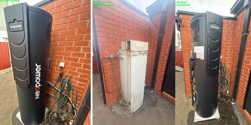 Side-by-side comparison of a new Neopower heat pump hot water system and an old Proflo hot water unit installed against a red brick wall outdoor