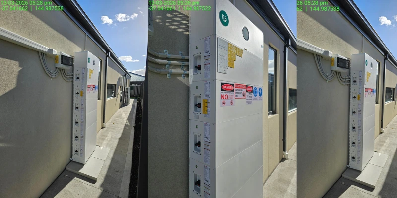 large-size battery and inverter system mounted on exterior wall of residential property in melbourne