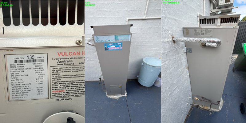 Vulcan 135 litre natural gas hot water system specification label, rooftop unit and insulated pipe relief valve on white rendered wall