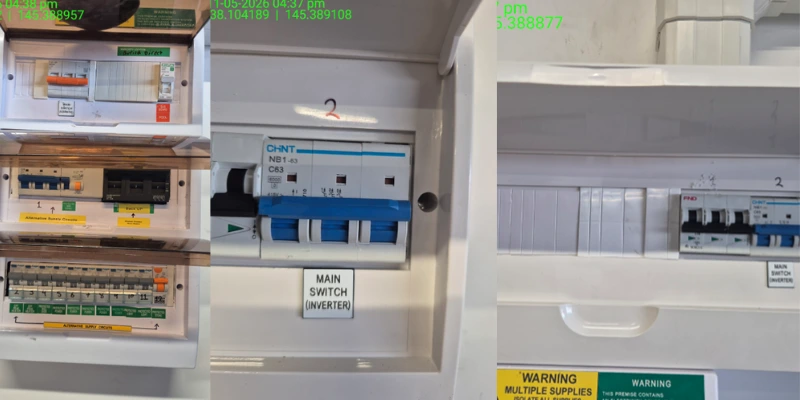 Electrical switchboard showing a CHNT NB1-63 C63 main switch inverter circuit breaker alongside multiple circuit breakers and a warning label for multiple supplies