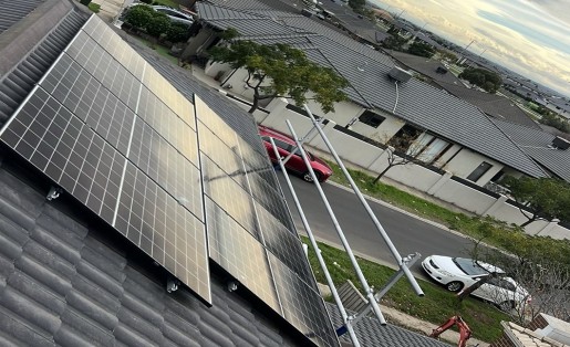Safety guard railing installed around rooftop solar panels in Truganina for WorkSafe compliance