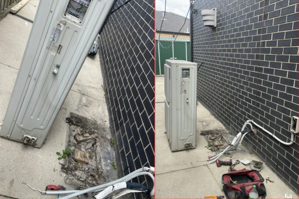 Old outdoor unit decomposed and lifted off its cracked concrete pad during removal in Lalor